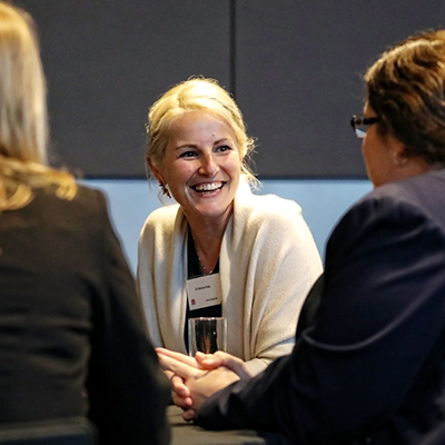 Dr Pajic speaking to two women