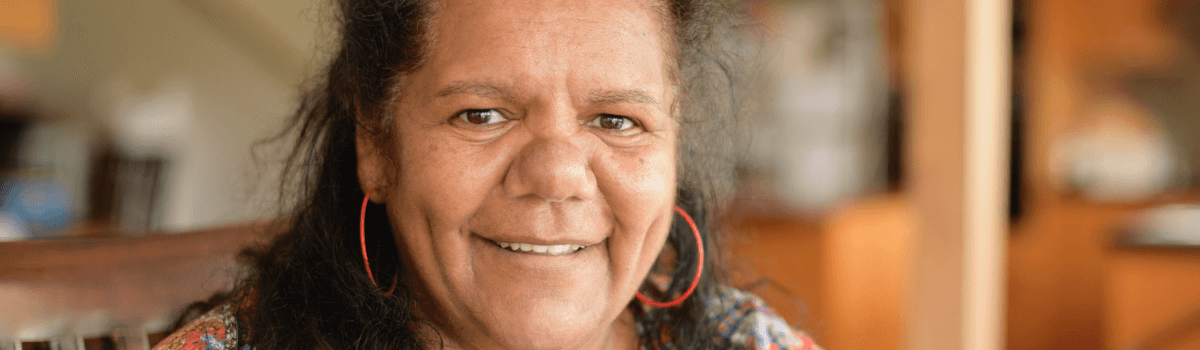 A woman smiling at the camera